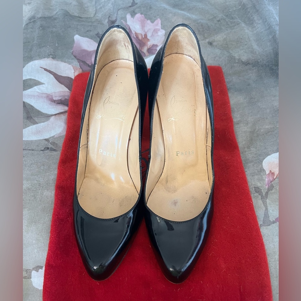 Christian Louboutin patent leather pumps